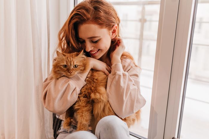 cute girl with companion cat