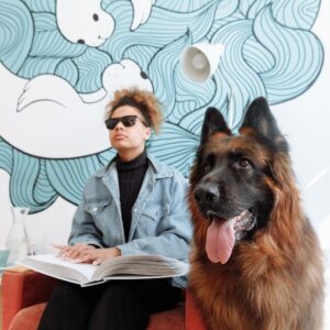 German shepherd service dog for ADHD providing calming support to handler