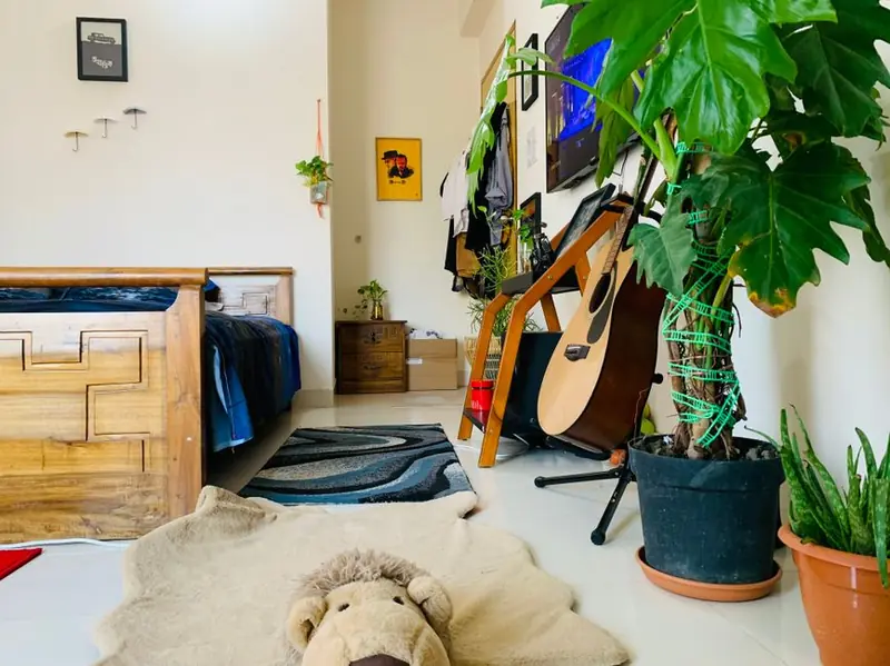 College student with emotional support dog in university dorm room